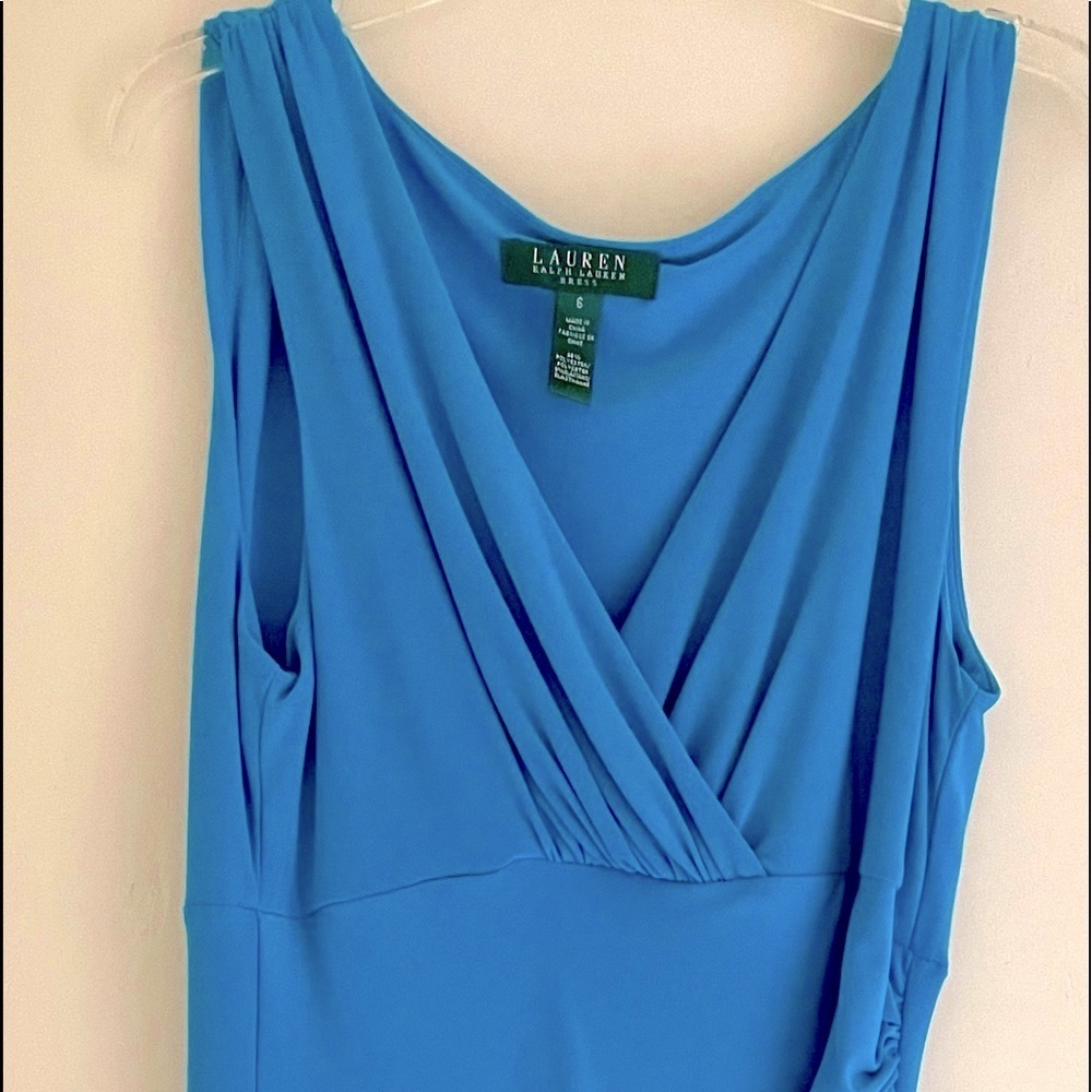 Mid-length, ruched dress. Turquoise color. Very flattering. Excellent condition.